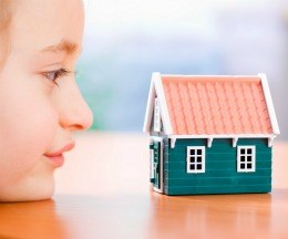 Child looking at house
